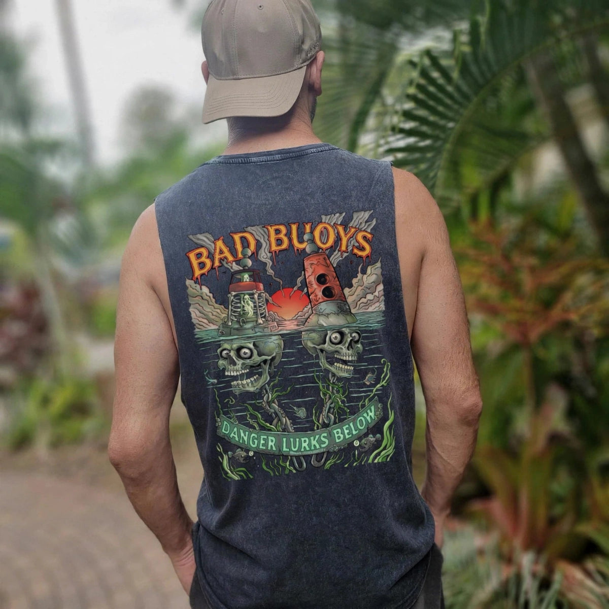 Man wearing Bad Buoys black stonewash tank rear view - skull buoy graphic acid wash singlet